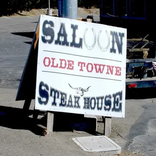 a sign in a parking lot