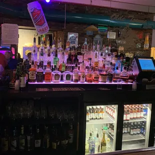 a bar with a lot of liquor