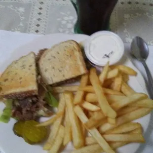 &quot;Old Tymer&quot; Sandwich with meat, cheese, and cabbage on rye (ranch on side) + French Fries.  Iced tea to drink . . .