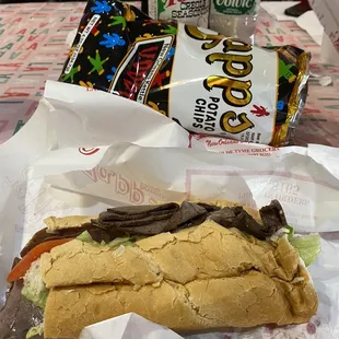 Roast beef 1/2 sandwich and zapps chips.
