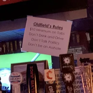 a sign that reads oldfield&apos;s rules