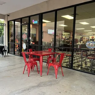 Entrance with outdoor dining