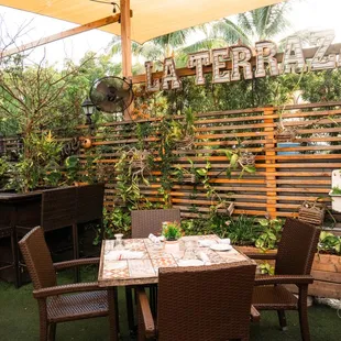 La terraza, the back patio of Old&apos;s Havana. Perfect to enjoy a cold mojito and a Cuban cigar