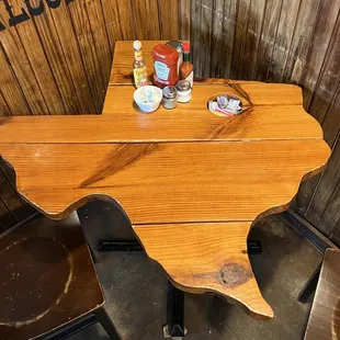 a wooden table and chairs