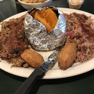 BBQ Combo. Beef &amp; Pork. Sweet potato and famous oblong hush puppies. That sauce. Awesome. As. Always.