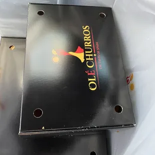 2 churro combo boxes.