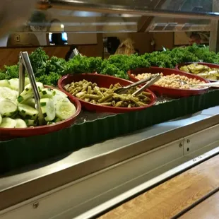 a variety of salads in bowls