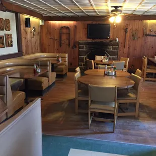 dining area with wood paneled walls
