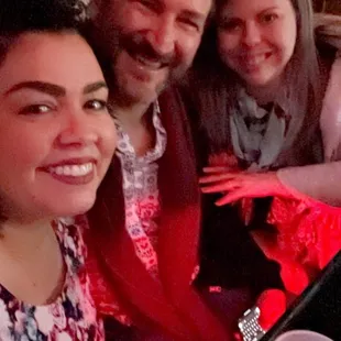 a group of people sitting at a table