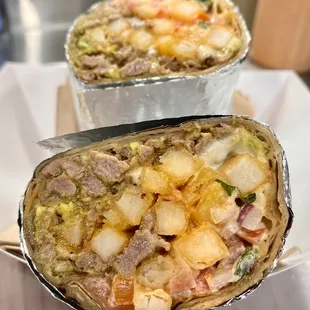 Cali Burrito! French fries, grilled steak, guacamole, pico de gallo, chipotle cream &amp; cheese. All wrapped up in a large flour tortilla