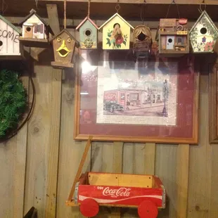 a coca cola wagon and birdhouses
