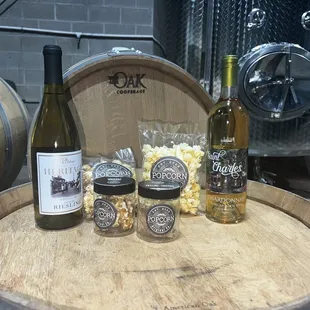  barrel of wine and bottles of wine