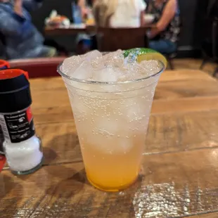 Mocktail with ginger ale, Sierra Mist, and peach puree. 5 dollars