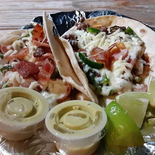 Suizo Taco.  Ham, Bacon, Beef, Mozzarella &amp; Grilled Poblano Peppers. &amp; I left some for yall. Dr Wiley Coyote SFO...