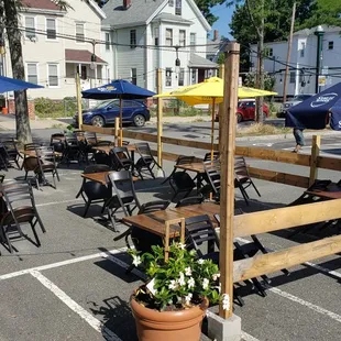 tables and chairs in a parking lot