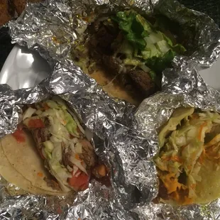 Tacos (from top, clockwise): steak, shrimp, carnitas.