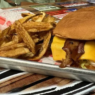 Burger with bacon and fries.