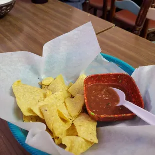 a bowl of chips and salsa