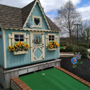 Several holes feature these cute little houses.