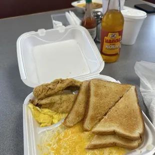 Fried whiting fish with cheesy grits and eggs with toast!