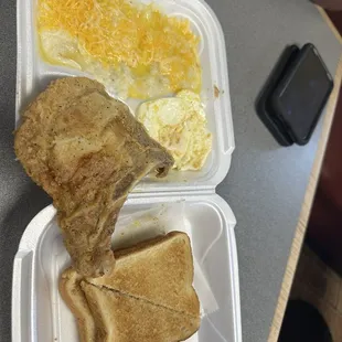 Fried pork chop with cheesy grits and eggs and toast!