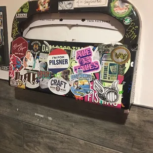 Toilet seat cover holder