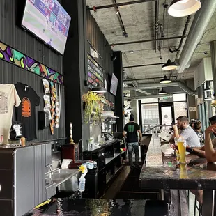 people sitting at the bar