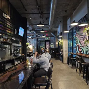 a man sitting at a bar