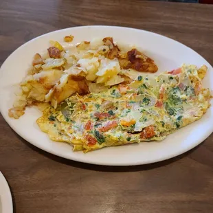 Veggie omelet and home fries