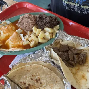 Huevos Rancheros with Barbacoa and a Lengua Taco