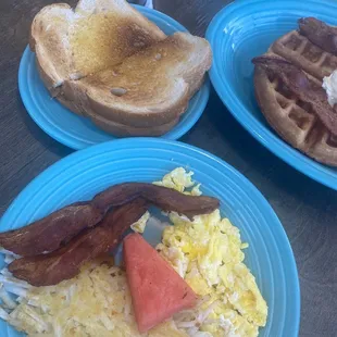 1 scrambled egg, 2 Bacon Strip, Hash Browns, sour dough toast.