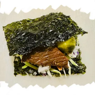 Seaweed &quot;sandwich&quot; made with (Mann&apos;s broccoli) slaw and Wagyu Kalbi Meal