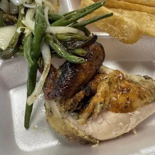 Quarter chicken white, green beans and yuca fries.
