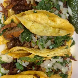 Al pastor and lengua tacos