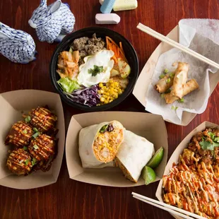 Totchos, spring rolls, rice balls, packed bowls