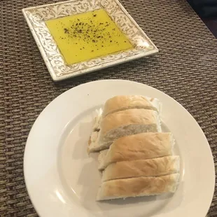 Cold, stale bread (only the 5 pieces the manager audibly told her server to give us).