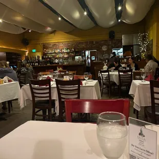 a restaurant with tables and chairs