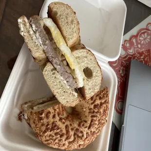 Egg and sausage bagel sandwich