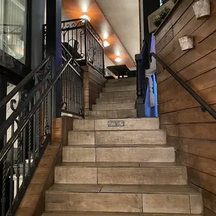 Stairs to bar and indoor seating