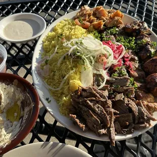 Family platter sample with shawarmas, keftas, &amp; kebabs