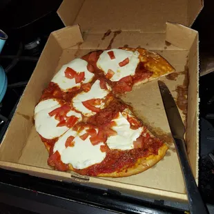 2/14/22. Quite possibly the worst margherita pizza I've had. Missing something???  Yeah. No basil.