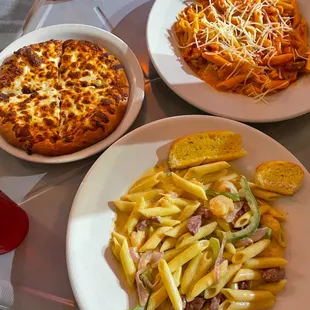 Bottom is Shrimp Carnival, Top is Spicy Cajun Trio. With garlic bread of course! instagram: @diningwithkels