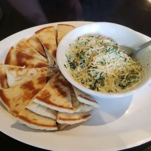 Spinach and artichoke dip with pita bread