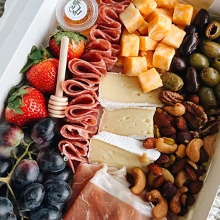 a box of fruit and cheese