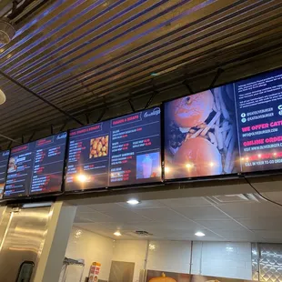 menus on the wall of the restaurant