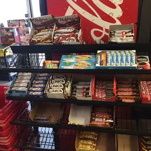 cooler with drinks and chocolate bars left side on entering