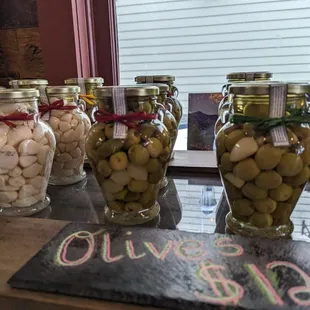 a variety of olives in jars