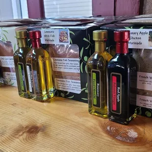 a row of olive oil bottles
