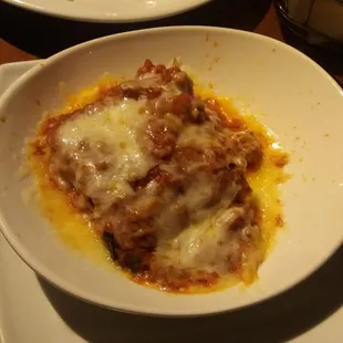 It was Lasagna, notice burnt parts at 7pm position.