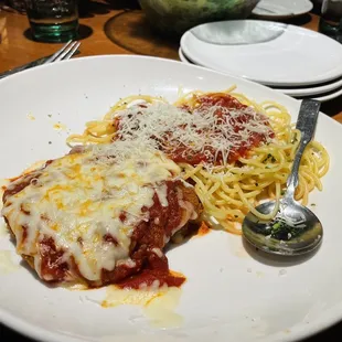 Chicken parmigiana split in half